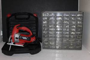 lot 143 image: Black and Decker Jig Saw and Metal Parts Holder