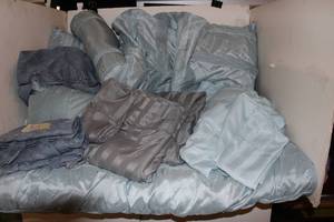 lot 180 image: Light Blue King Size Bedding, Comforter, Decorative Pillows matching Sheet set and Grey Sheet Sets with extra pillow cases