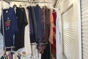 lot 209 image: Large Variety of Ladies Clothes in styles and Colors as shown