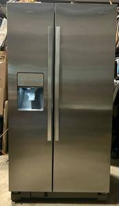 lot 1 image: 36 Side by Side Refrigerator by Whirlpool model #WRS325DAM