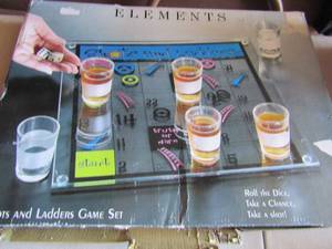lot 32 image: Elements shots and ladders game set NIB
