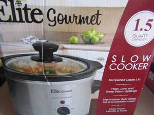 lot 34 image: Mini Elite slow cooker NIB