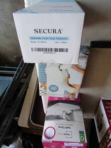 lot 35 image: Main stay Soft terry Mattress protector queen zippered, Secura foam soap dispencer NIB, Body Benefits messager NIB