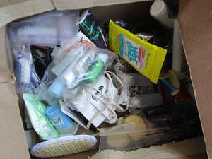 lot 44 image: Used lot of bathroom items such as soaps, iron, combs, tissue new, perfumes and much more