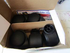 lot 56 image: Boxes of Deluxe futura wheels for office chairs, small desk or tables qty 2 new