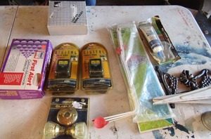 lot 90 image: Digital camera video ac adapter qty 2 both new, clip on book light, Carbon manoxide detector, and more