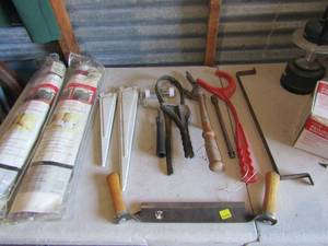 lot 117 image: Tool and shop lot includes, furniture tuck 1 grip qty 2 packs used, strap clamps and a dB handled cutter, lantern, new bathroom faucet