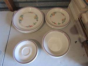 lot 121 image: Lot of Corelle dishes includes, 8 cup saucers, 7 cereal bowls, 8 dinner plates, 8 salad plates, grand total of pieces qty 31