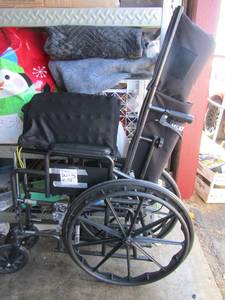 lot 2 image: McKesson High Back Wheelchair NEW, Holds 30.1KG is what it says onside of it, very nice also has a seat cushion included