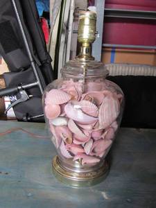 lot 17 image: 13 clear glass lamp with sea shells inside it has no shade with it but there are shades available to pick from.