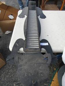 lot 13 image: 4214 Metal black cat dvd or cd holder, sits on the floor
