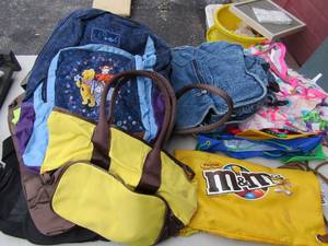 lot 140 image: Back pack and bag lot includes M%M, winnie the pooh and more