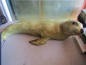 lot 152 image: S.6364 ceramic seal, has a small break in tail, made in italy size, 6238 approx.