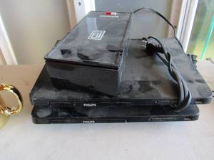 lot 153 image: Beta video cassette rewinder, philips DVD player qty 2 no remote for either item