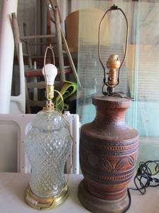 lot 155 image: Clear glass lamp with no shade 26 tall has  a brass bottom, Carved ceramic side lamp with no shade, 32 tall