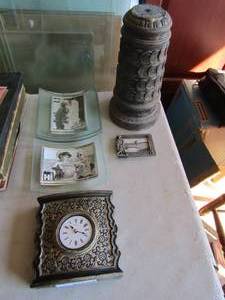 lot 163 image: 53 glass curved pic frames new, small table clock, golf pic framed new, 16 tower dcor