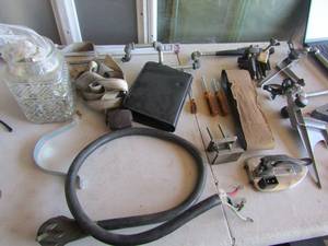 lot 171 image: Misc. lot of outside garden sprayers water sprinklers, clamps, vintage clear glass cabinet nobs, dryer plug and more