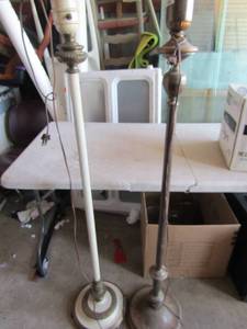 lot 172 image: White and Brown metal floor lamps neither one has shades, unknown working condition on both approx. 5 ft tall