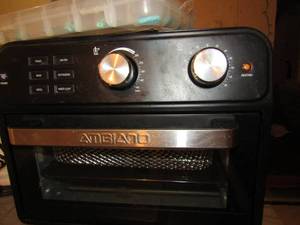 lot 191 image: Ambiano Air fryer oven with rotisserie, bran new with out original packaging has all the paper work and recipes.  Original price $99.99