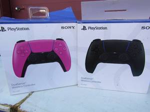lot 249 image: NIB PS5 controllers qty 2 colors are Black and Pink