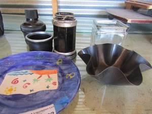 lot 22 image: black bathroom counter set used, blue saucer , square glass candy dish, metal mold