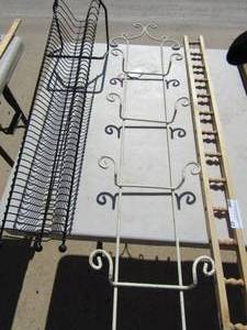 lot 47 image: Black DVD or CD holder new, wooden wall rack, metal plate holder holds 4 plates white in color