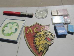 lot 57 image: ACC plaque, divided ash trey, various new and used decks of cards,