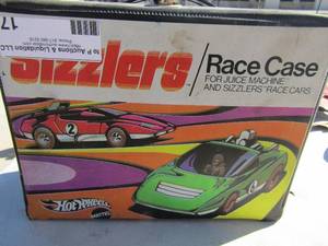 lot 17 image: Sizzlers race case for the juice machine