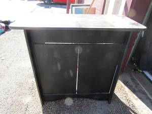 lot 66 image: black tv stand 28x38x15 2 front doors no back