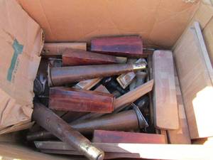 lot 82 image: Box of vintage wooden door knobs and legs feet for tables or chairs