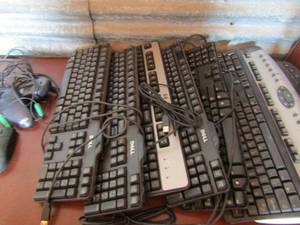 lot 87 image: qty 7 new and used dell computer keyboards and 3 used dell computer mice