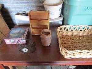 lot 96 image: ted blaylock spirt of crist 750 piece puzzle new, 6in pottery vase with crack pieces included, handled metal wicker basket, 5x18x14 wicker basket, hanging mailbox that opens with key hangers inside