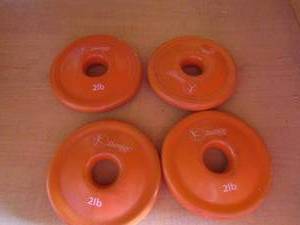 lot 97 image: 4 orange 2 pound weights by danskin