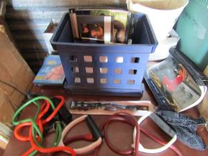 lot 99 image: 4 excersice videos, workout books, and arm stretchy bands