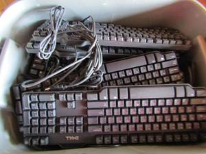 lot 132 image: grey tote with 15 dell computer keyboards newused