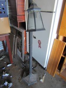 lot 139 image: 54in tall black electric yard light need repair