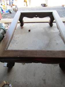 lot 145 image: CUSTOM MADE COFFEE TABLE (1 of a kind -  CREATED BY WOOD ARTISIAN IN  DALLAS PAID $8500 PER OWNER) -  17x58x43  missing the glass top solid wood great condition Beautiful table
