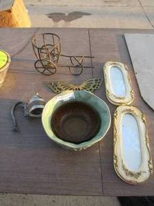 lot 150 image: 2 8in wall mirrors, 2 kitchen bowls, and a metal wagon, brass butterfly art