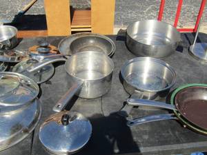 lot 154 image: large lot of new and used pans,lids,skillets and paper towel holder