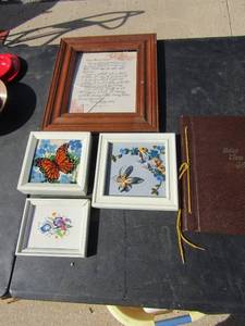 lot 186 image: better than gold book, dear mom and dad poem framed glass broke, paper mashe framed butterfly wall art, and other small wall art