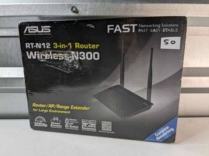 lot 50 image: NEW ASUS RT-N12 (N300) Wireless 3-in-1 RouterAPRange Extender - SEALED