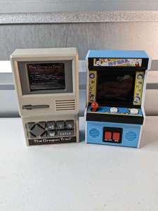 lot 60 image: The OREGON TRAIL & Fix It Felix JR Handheld Electronic Computer Game