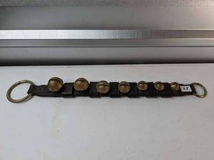 lot 63 image: Door Hanger 7 Graduating Sleigh Bells