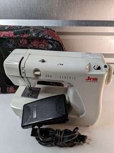 lot 120 image: Janome Jem Sewing Machine Model 639 with Floral Storage Bag