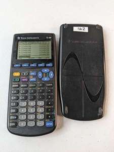 lot 162 image: Texas Instrument TI 89 Graphing Calculator - w Cover