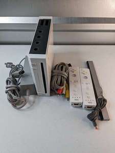 lot 176 image: Nintendo Wii model rvl-001 White Console with 2 controllers