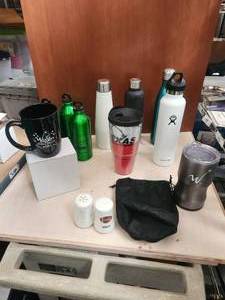 lot 73 image: Selection of metal water bottles and coffee cups