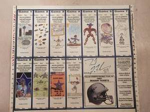 lot 44 image: Sheet of 1997 Dallas Cowboys season tickets - signed by David LaFleur