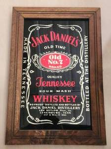lot 55 image: Jack Daniels mirrored wall decor.