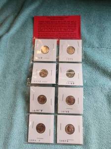 lot 82 image: 8 Brilliant uncirculated Roosevelt Dimes -